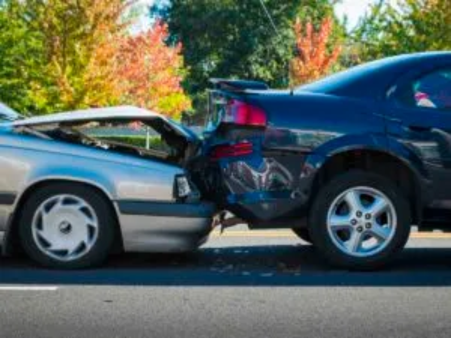 Auto accident involving two cars on a city street