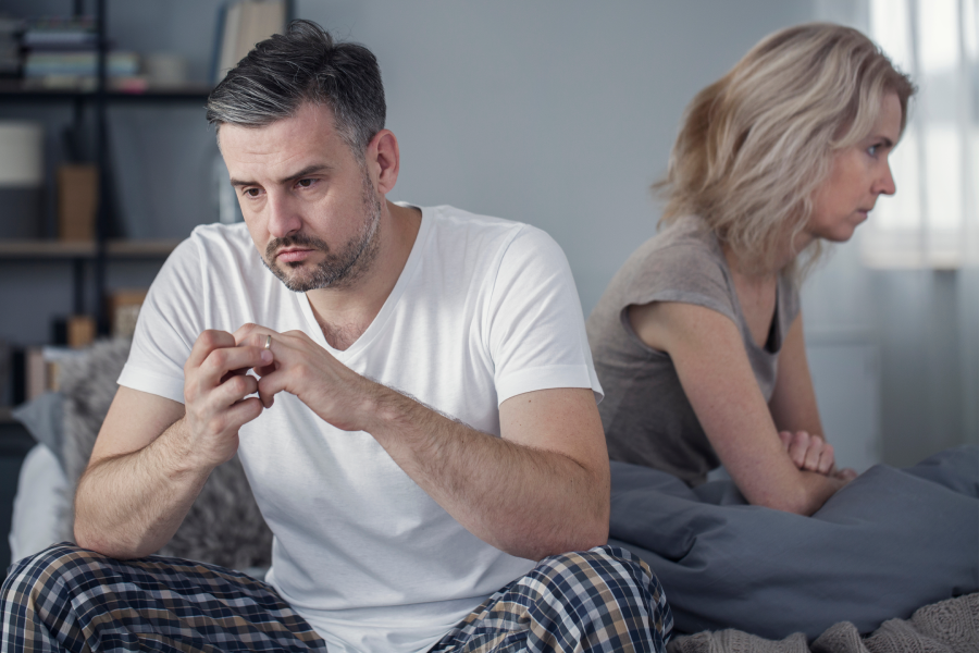 Man taking off his wedding ring after his wife announced that she wanted to get a divorce