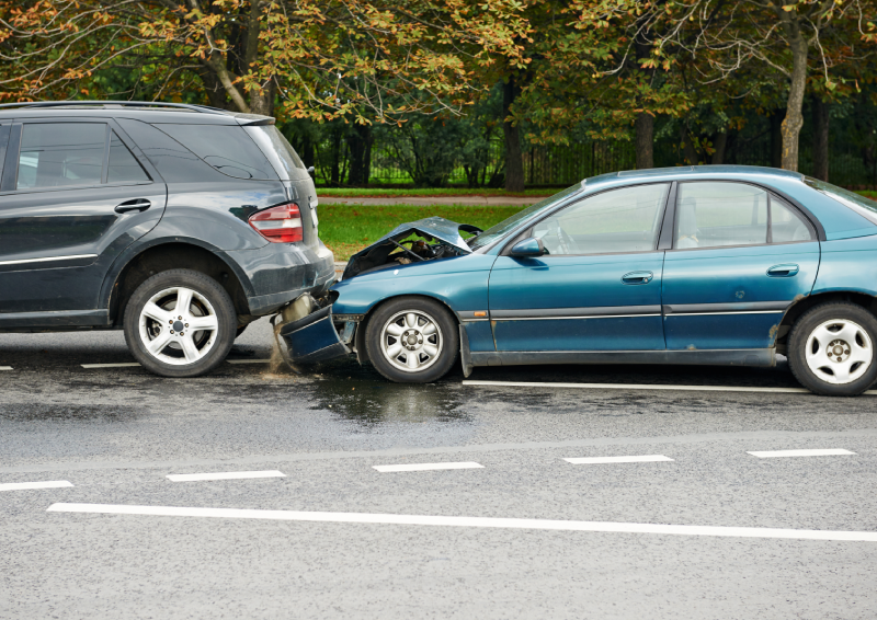 car crash accident on street, damaged automobiles after collision in city