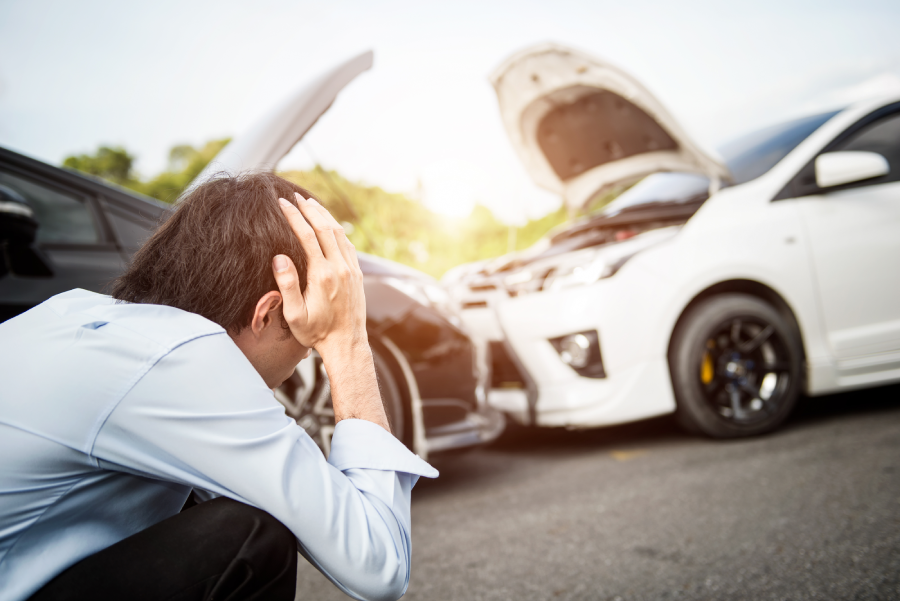 Asia man driver man in front of automobile crash car collision accident in city road.